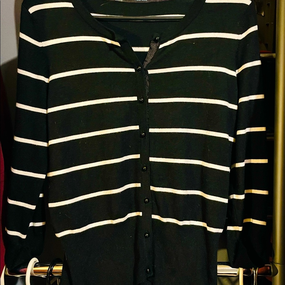 Woman’s Large black and White striped cardigan. Maurice’s brand. Lightly worn.